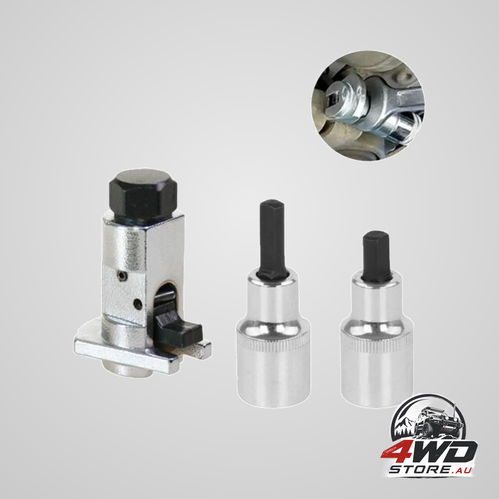 Wheel bearing housing spreader tool for shock absorber removal