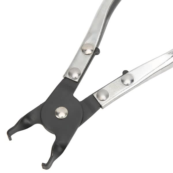 Wheel nut cap removal pliers with metal tip — view 3
