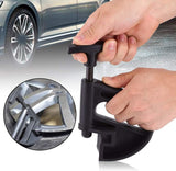 Tyre changer drop centre rim clamp — view 2